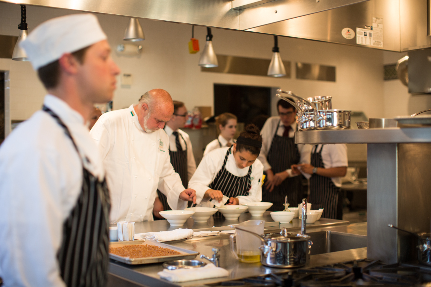Forgione advises a student at The Conservatory. (photo courtesy Culinary Institute of America)